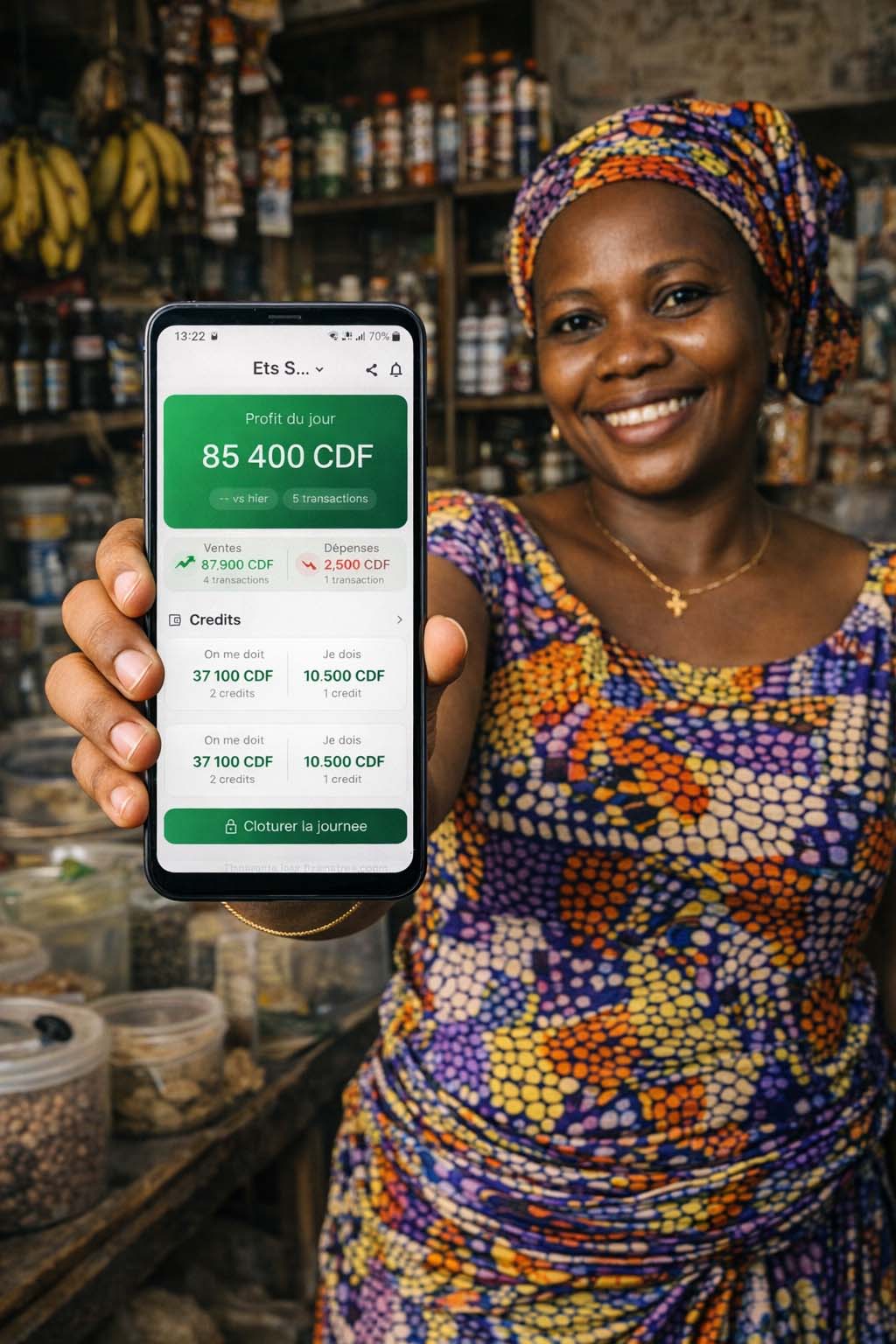 Vendeuse utilisant Mosungi dans sa boutique a Kinshasa